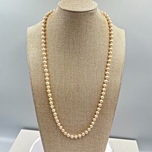Vintage Cream Faux Pearl Opera Length Necklace Ornate Silver Tone Floral Clasp